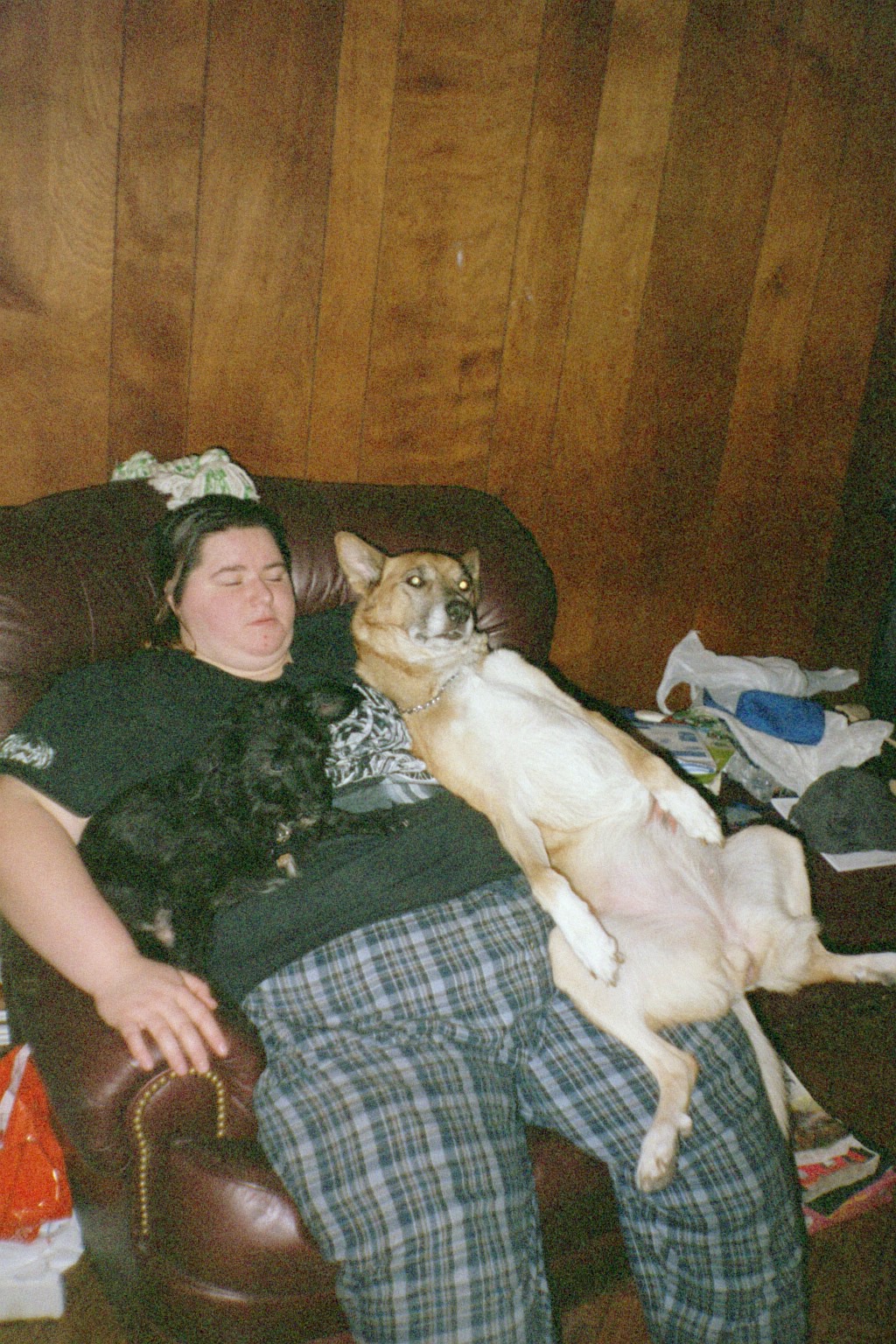 Winter 2005 with me holding my dog Cheyenne and my friend's dog Ebby on my lap