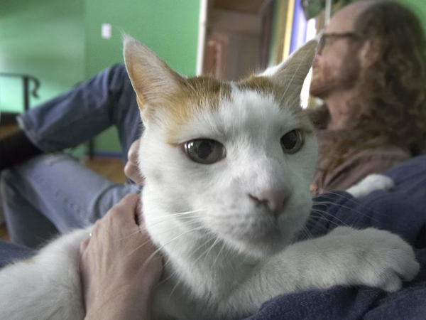 Cato - in my hands with Danny in background (by Joe)