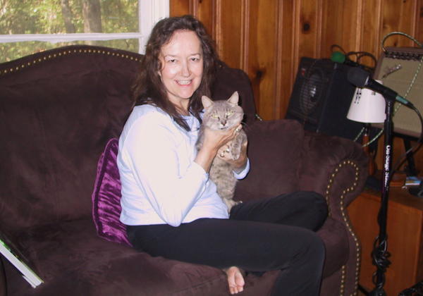 Beth, Tab's owner, happily holding him  Update:  When Beth passed away, I had to take Tab.  He lived for a few months after.  I miss them both!